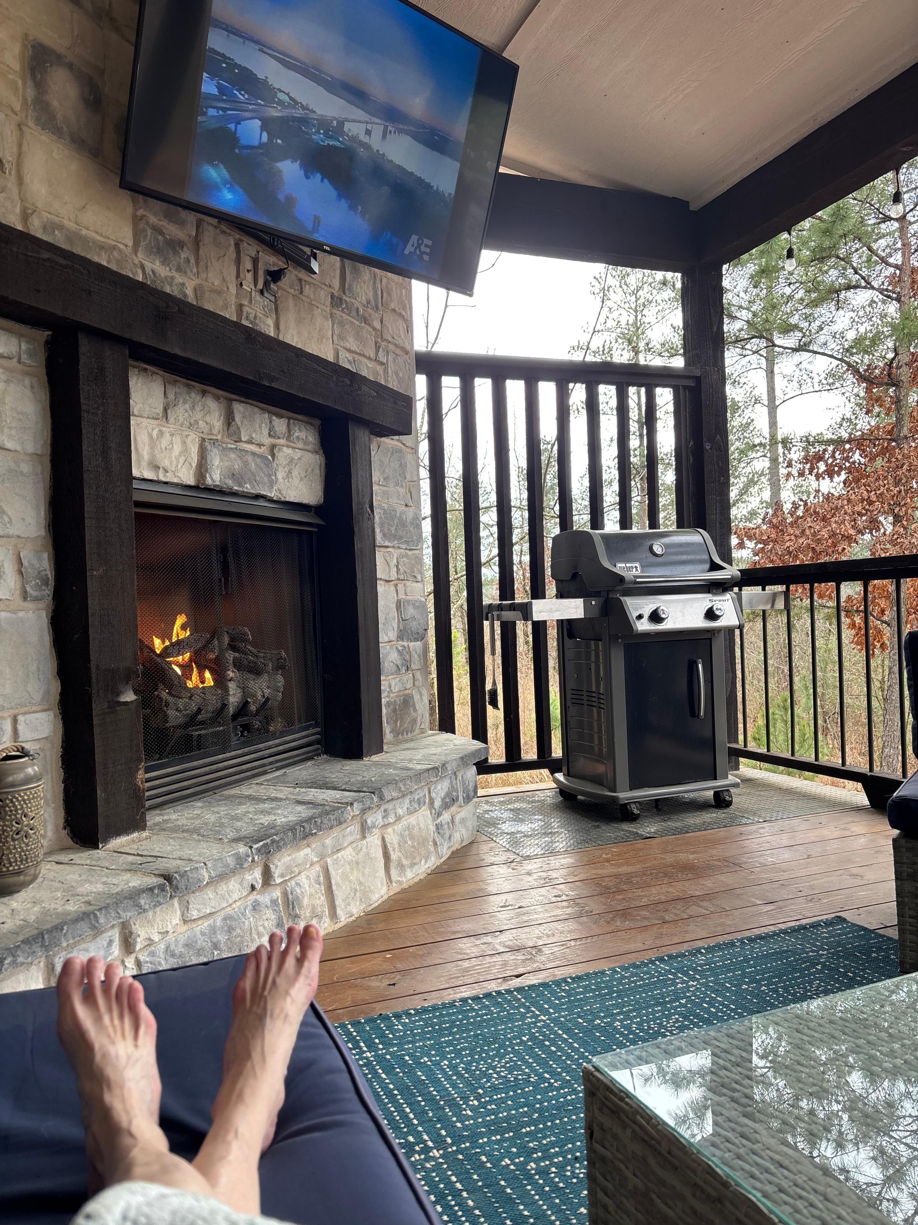 We watched movies outside with the nice fireplace. 