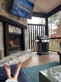 We watched movies outside with the nice fireplace.