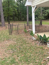 Pet enclosure. The only secure outdoor spot to leave pets in a “pet friendly” place.