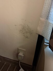 Mold next to the air conditioner.