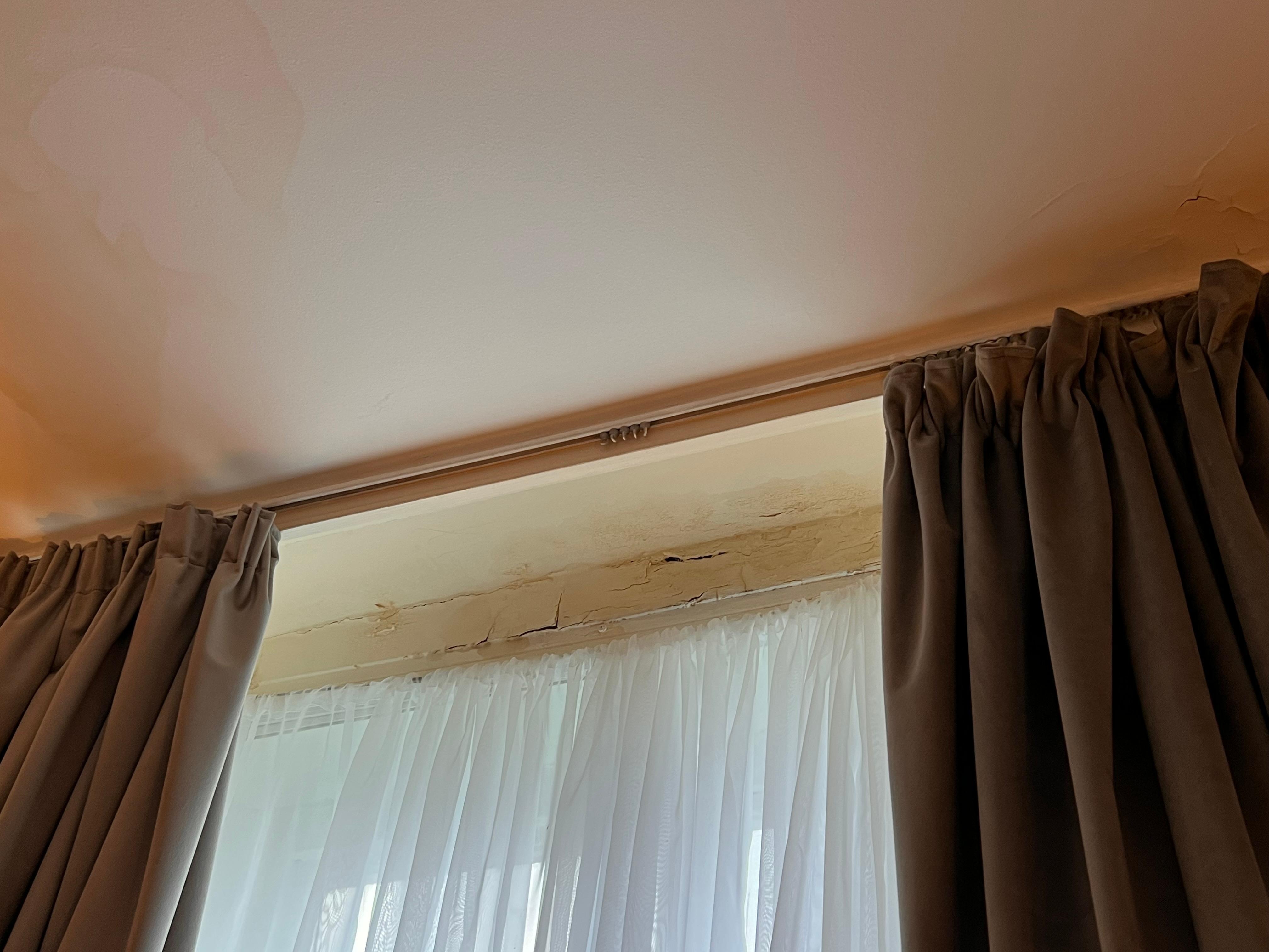 Peeling / damaged walls above window