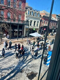 Looking out the window.