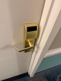 Door lever is very loose requiring the lever to be lifted before twisting it