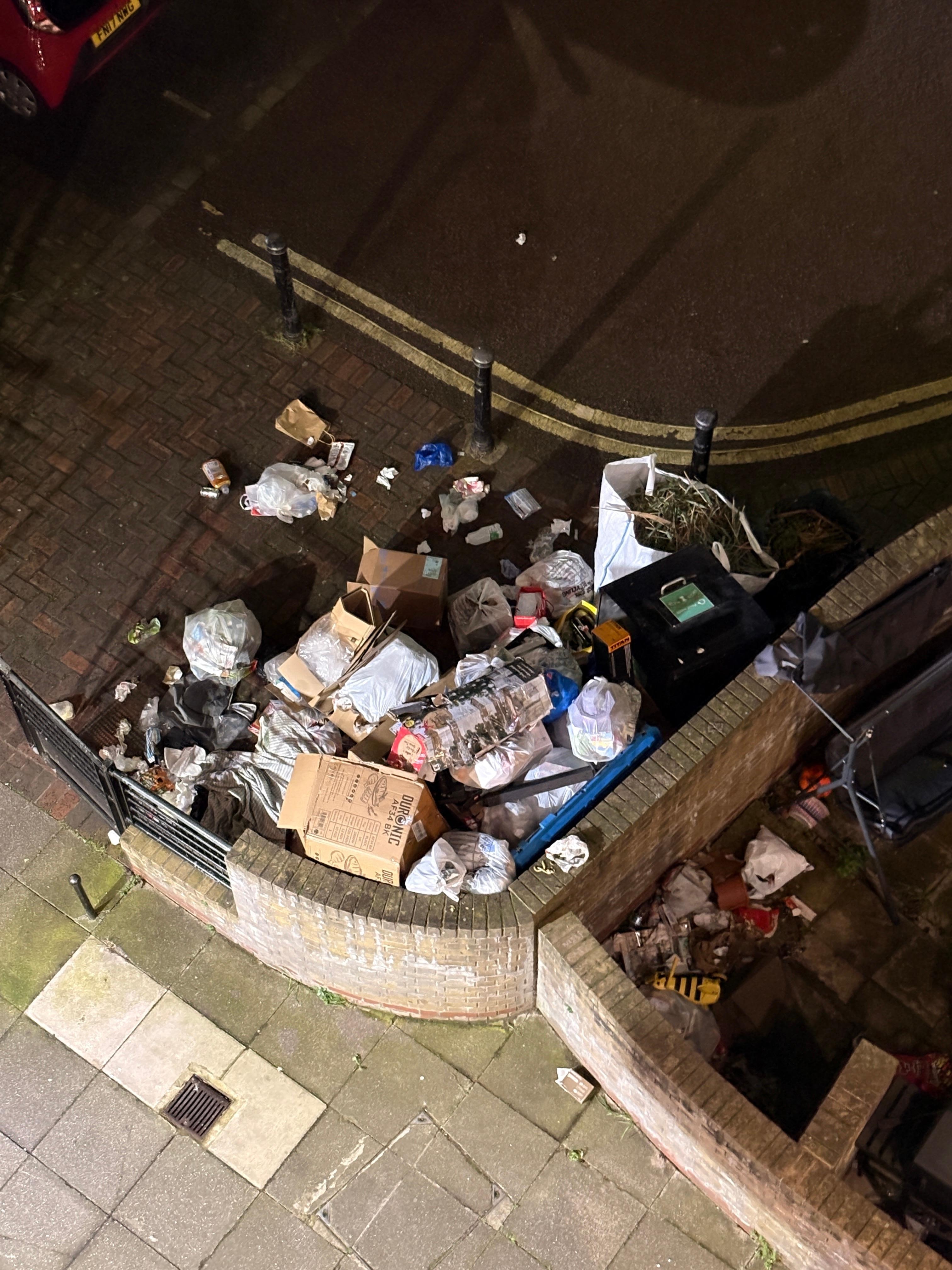 Overhead view of the trash spilling everywhere 