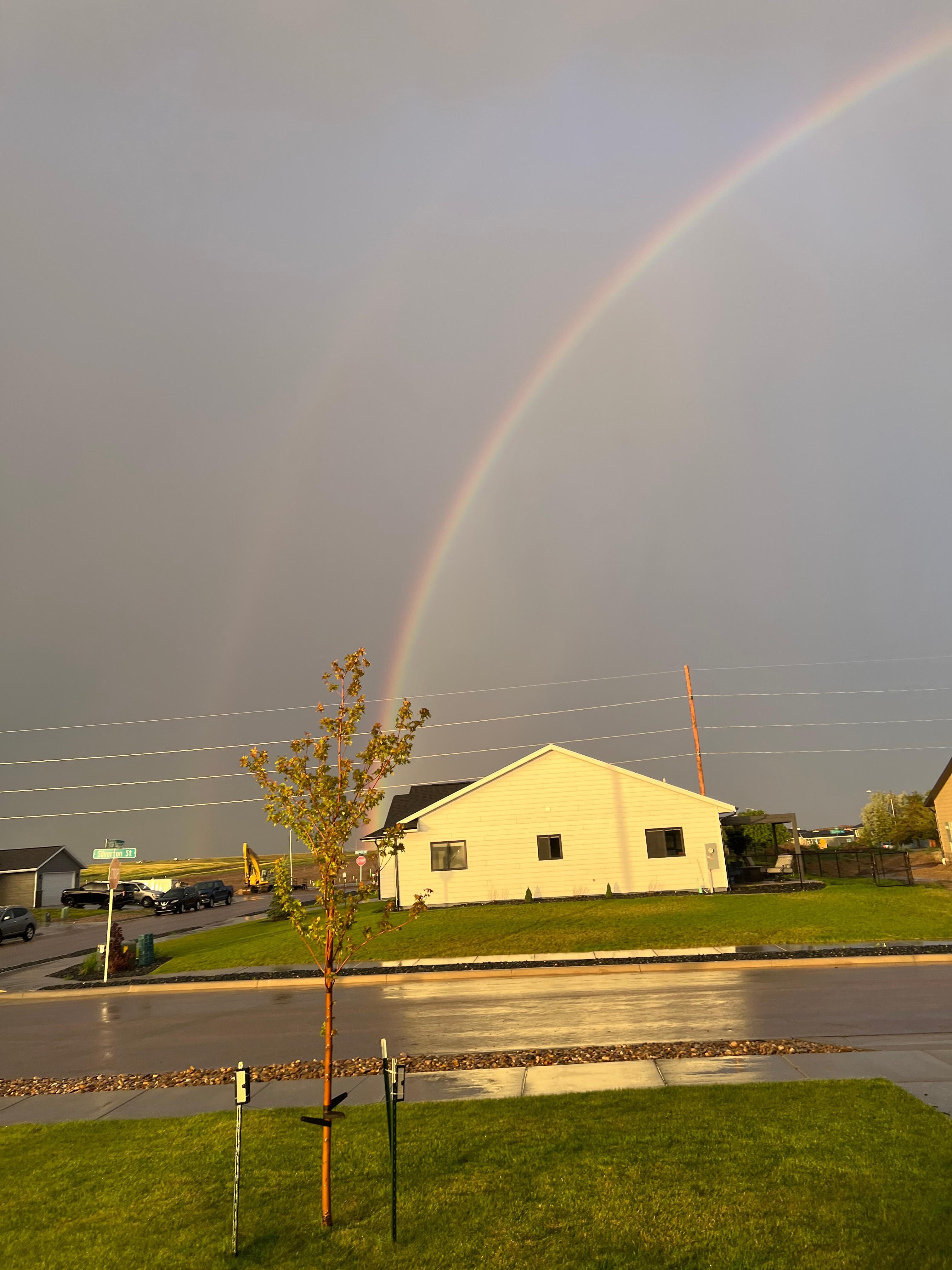 Rainbow after the storm looking east from the front porch