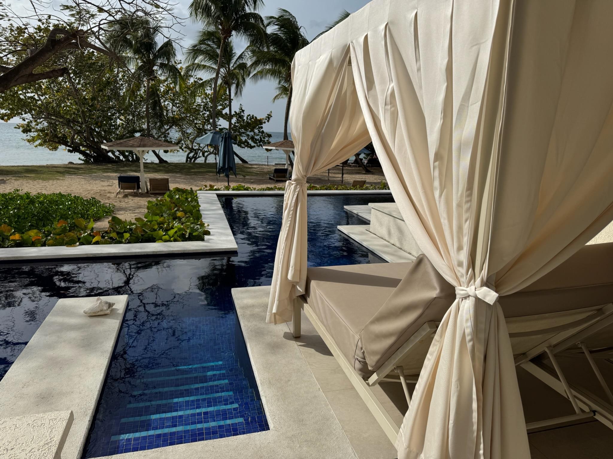 View of swim up pool steps from the outside of the room