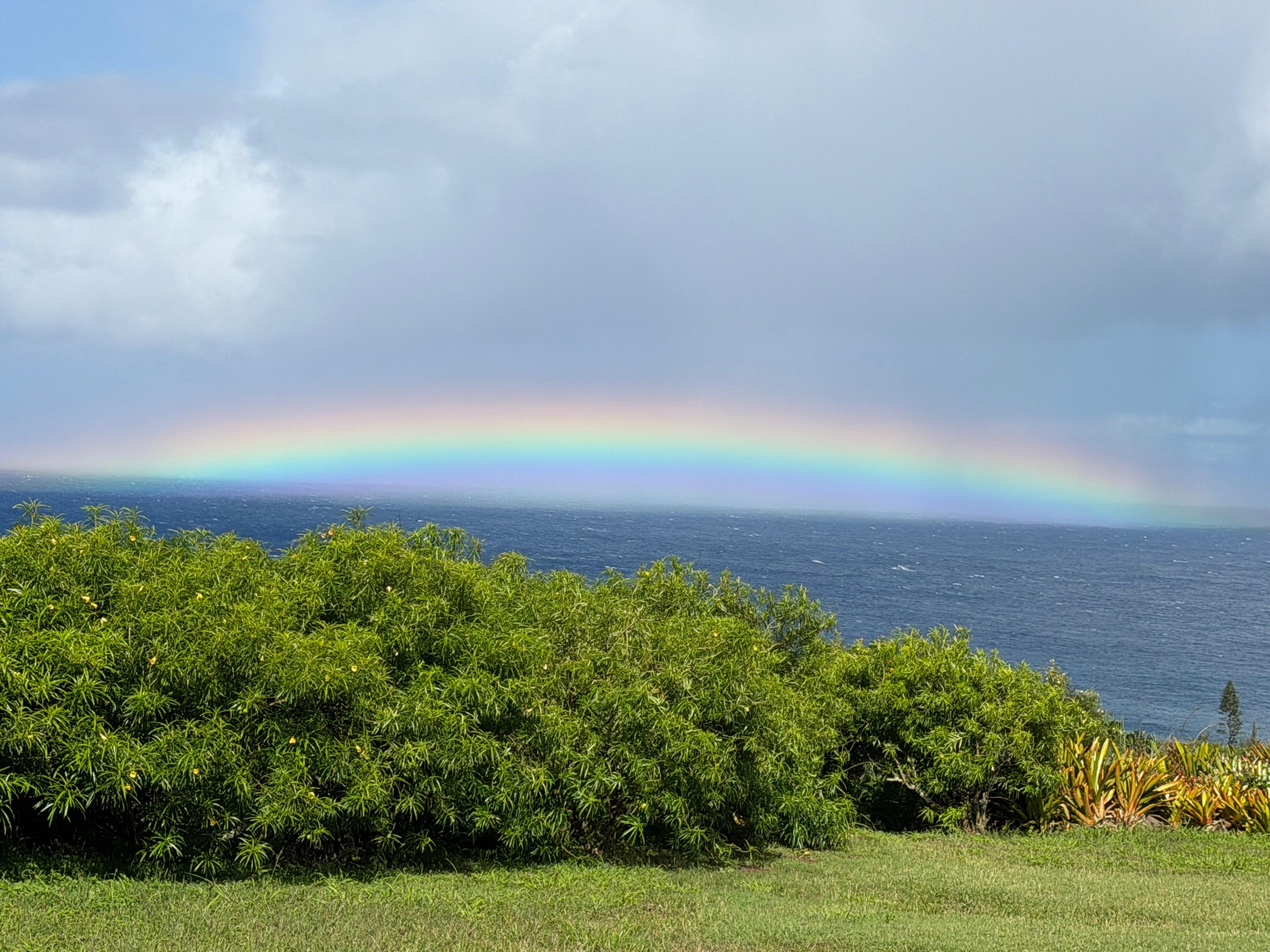 Backyard view over the ocean to gorgeous rainbow one morning