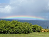 Backyard view over the ocean to gorgeous rainbow one morning