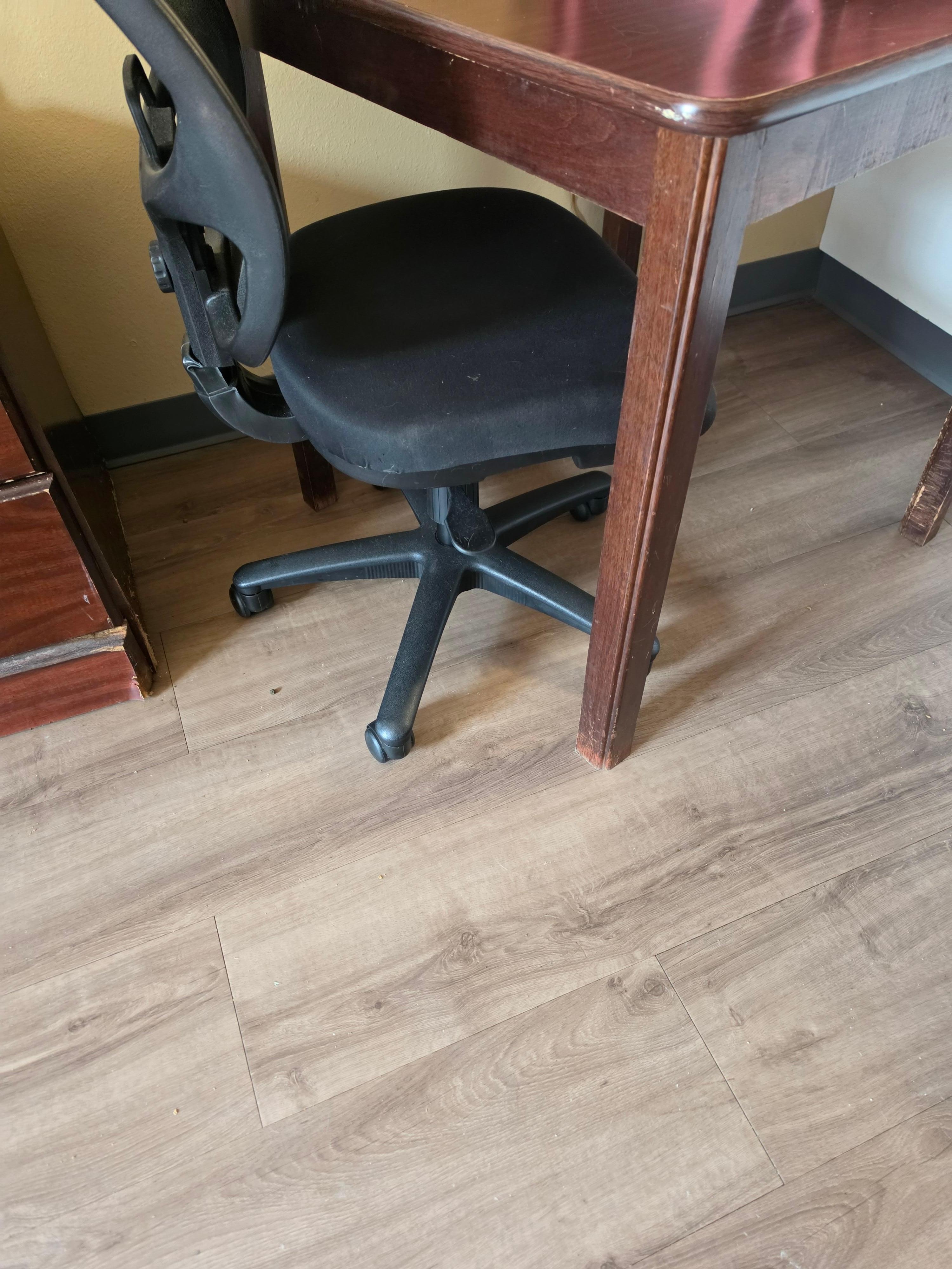 The floor is slick, smooth wood looking tile.  The chair by the table was nasty filthy, slid out from underneath me causing me to fall. Iwas unable to get up for over 20 minutes, and my right knee is still not healed, I am still using a cane.