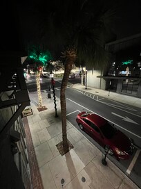 View of the Downtown Square, Christmas lights from the balcony.
