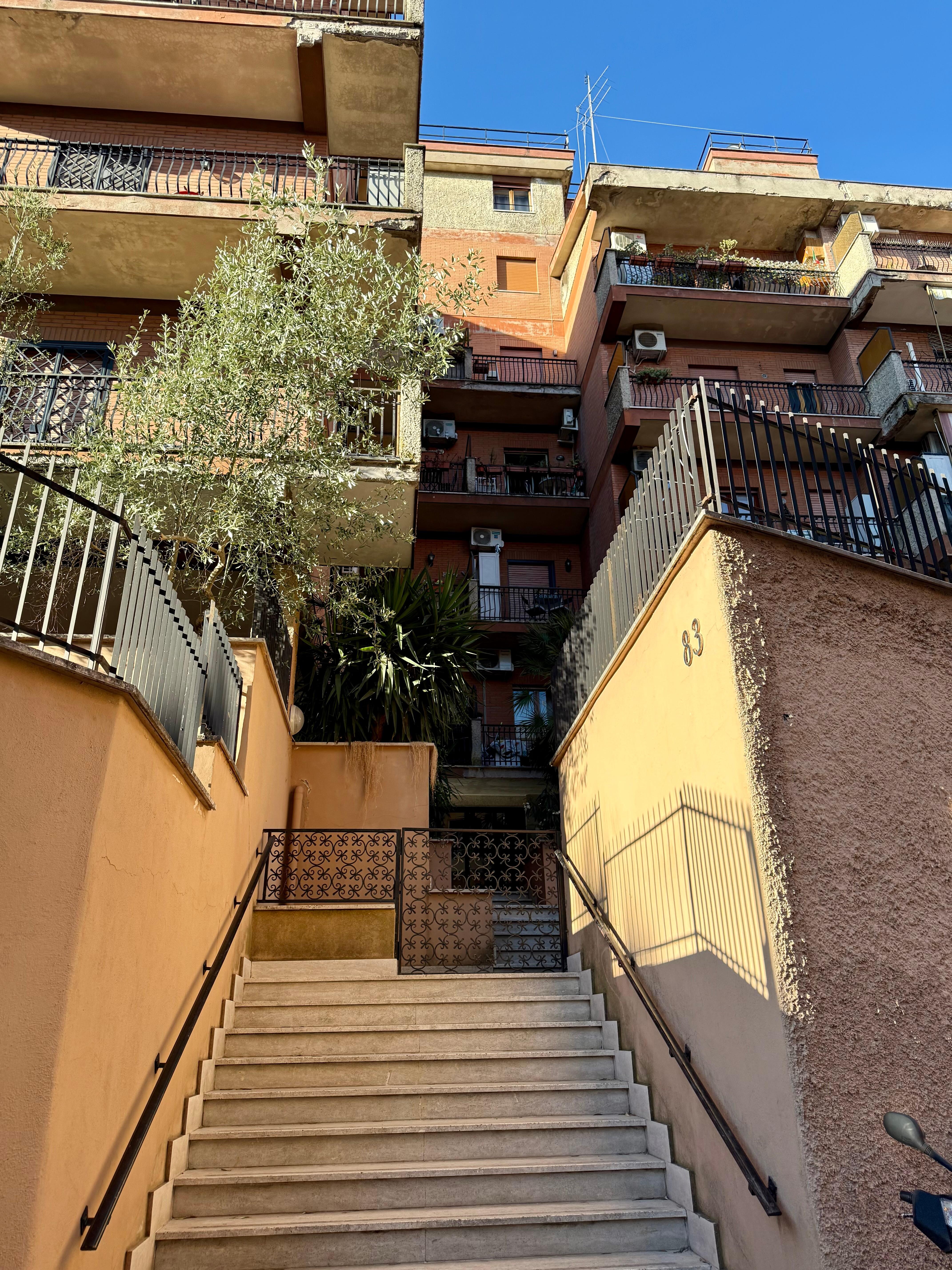 Entry to apartment building stairs.  
