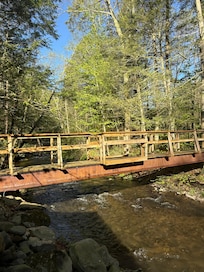 The bridge out the back with little benches carved in.