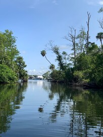 View from a canal looking towards the house.