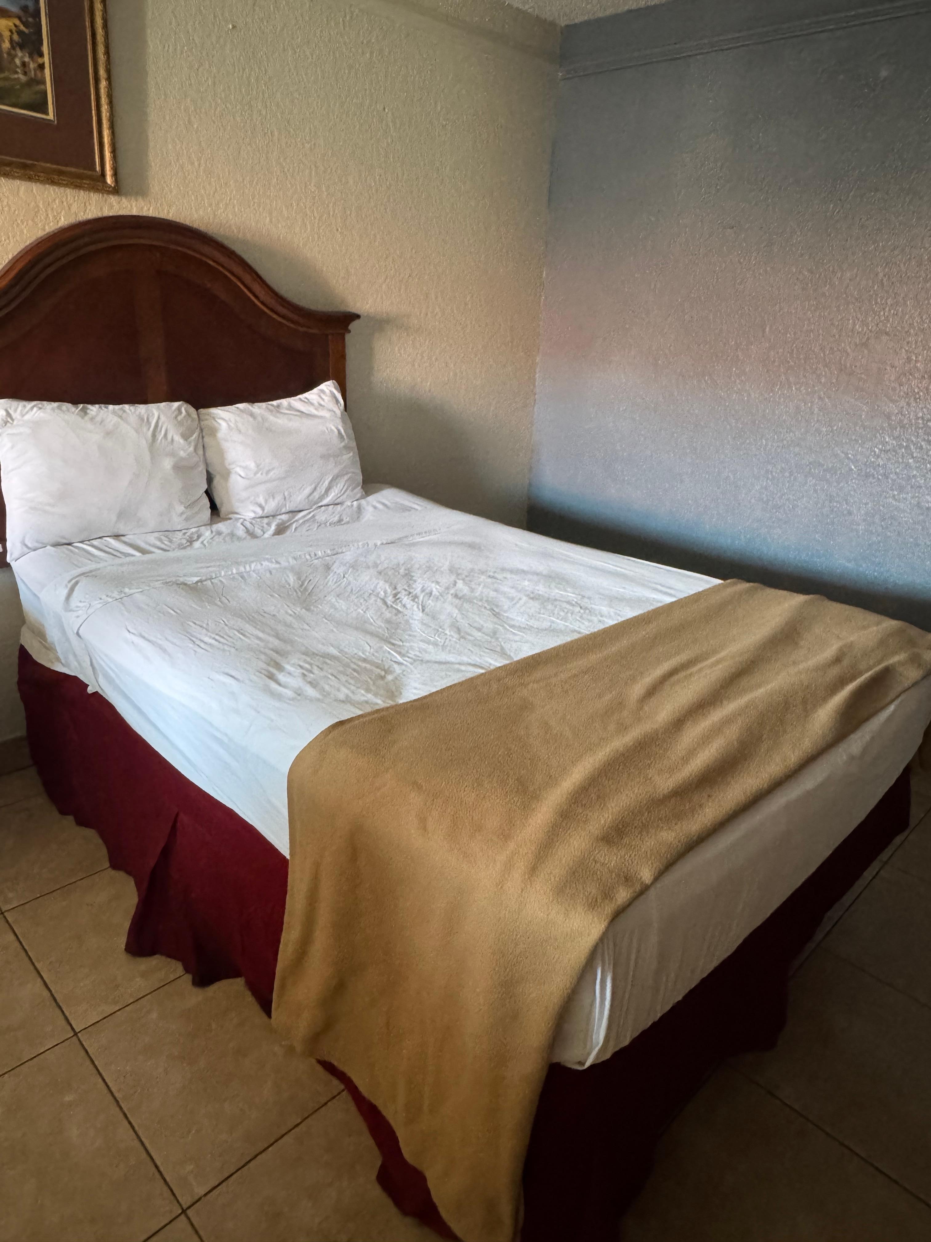 Bed looked like someone was jumping on it.