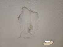 Unrepaired damage to ceiling
