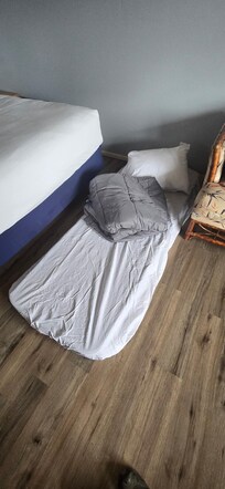 The “extra bed” that was brought in..