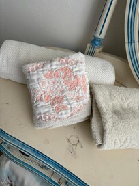 Old towels and dirty dresser