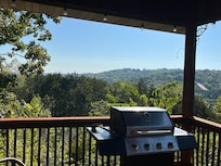 Nice grill and plenty of seating on upstairs patio