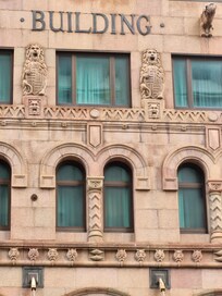 The striking facade of the building from 1934, the lion's protection