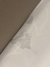 Unknown substance on our bed sheets.