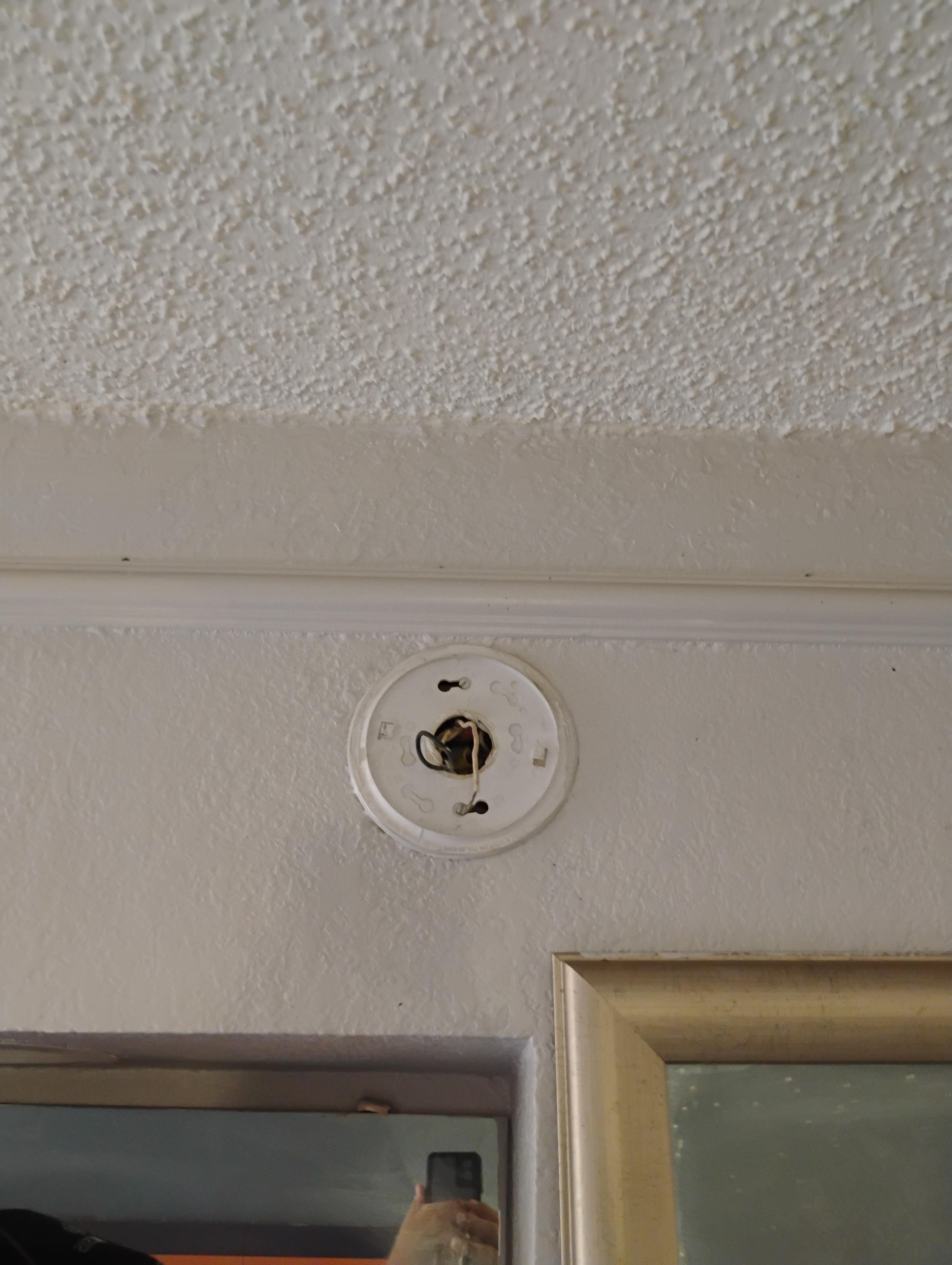 Collapsed ceiling above TV