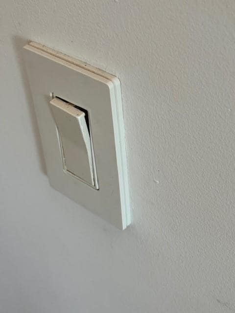 Multiple light switches and dimmers broken and not functioning correctly. Multiple light bulbs broken/missing or burned out in the bathrooms/kitchen/outside.
The window lock in the basement was broken also. Would not lock.