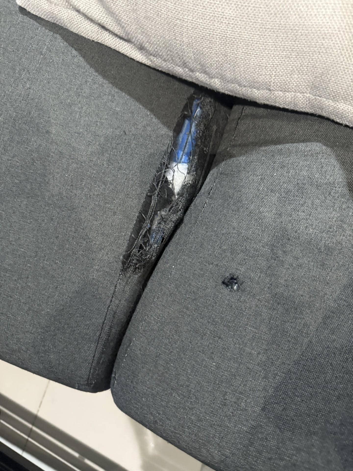 Couch with broken frame and cushon