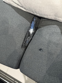 Couch with broken frame and cushon