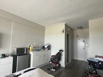 Here is a photo of the 1 king suite with ocean view. Nothing like the photos depicted on both the Expedia website and the Hotels website. Like a bunch left over stuff put in a back room.