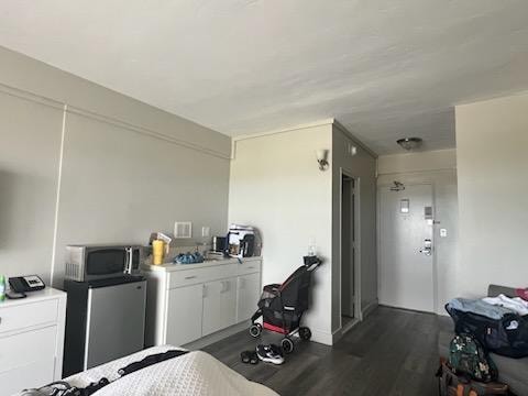 Here is a photo of the 1 king suite with ocean view. Nothing like the photos depicted on both the Expedia website and the Hotels website. Like a bunch left over stuff put in a back room.