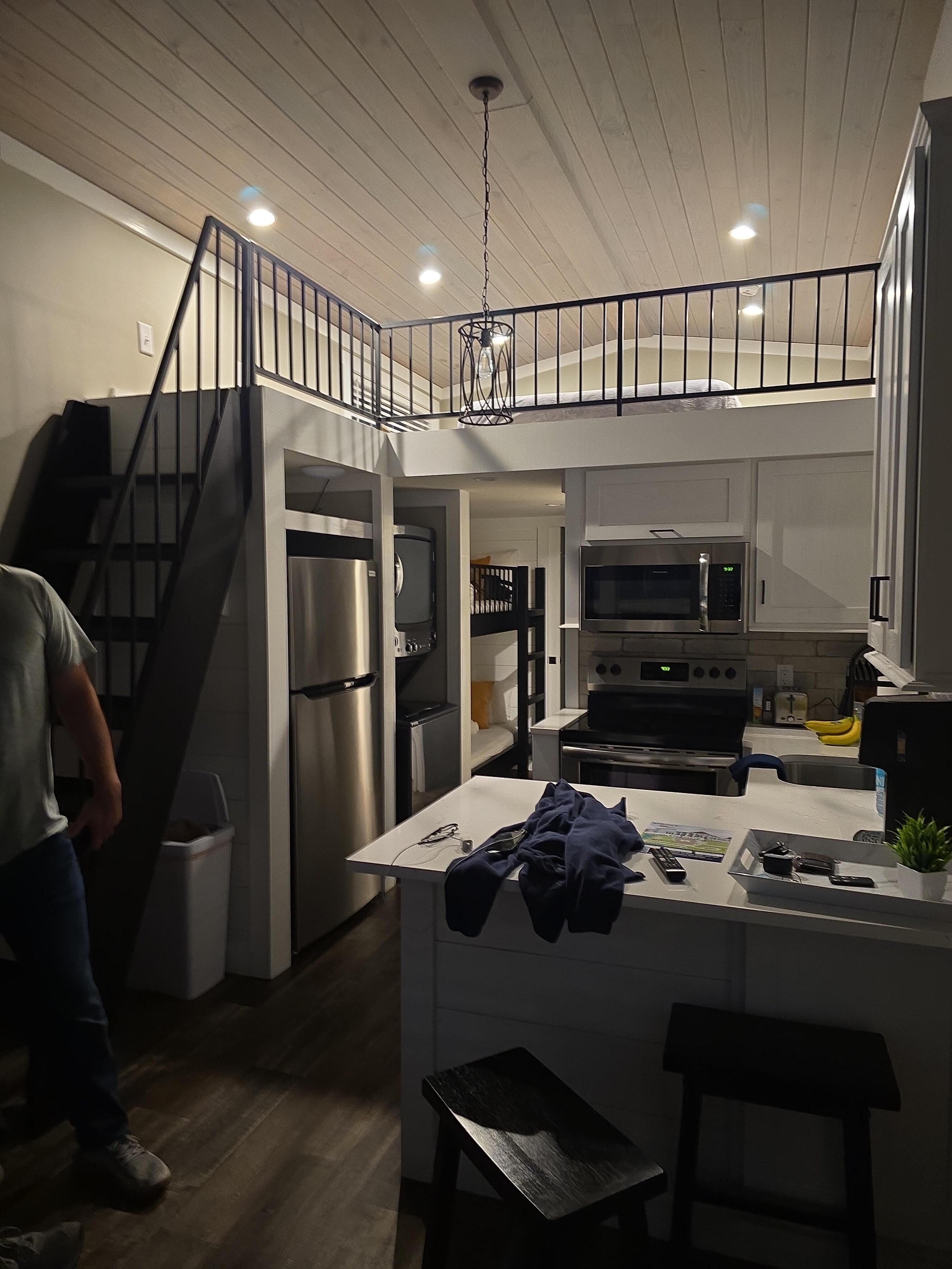 This will give you an idea of the layout. The guy on the left is about 6 ft tall he stayed in the loft.