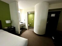 king room looking at bathroom and door