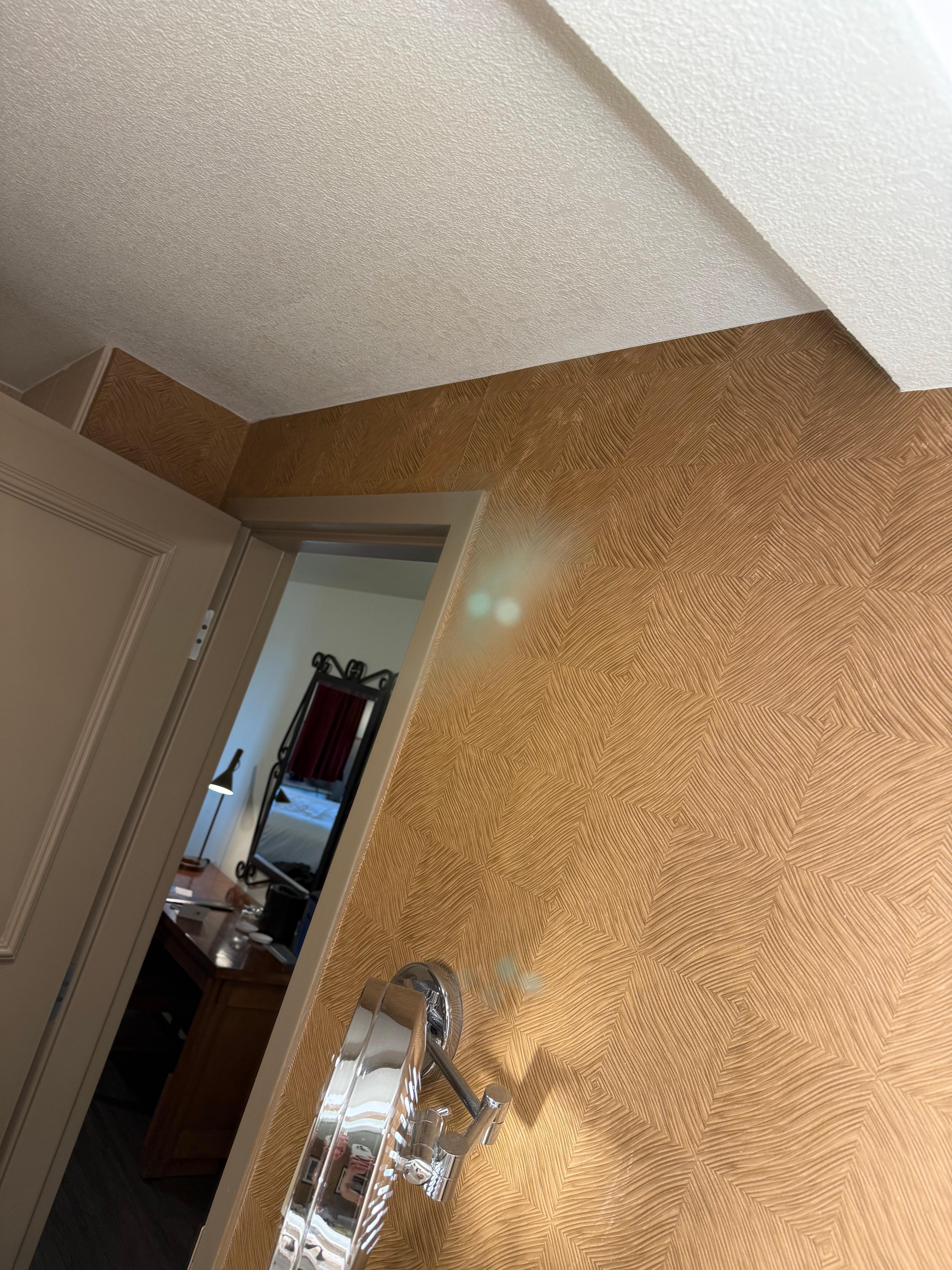 Scratches in bathroom mirror glass