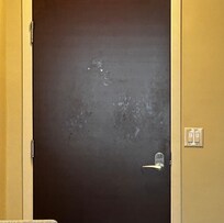Greasy finger prints on door