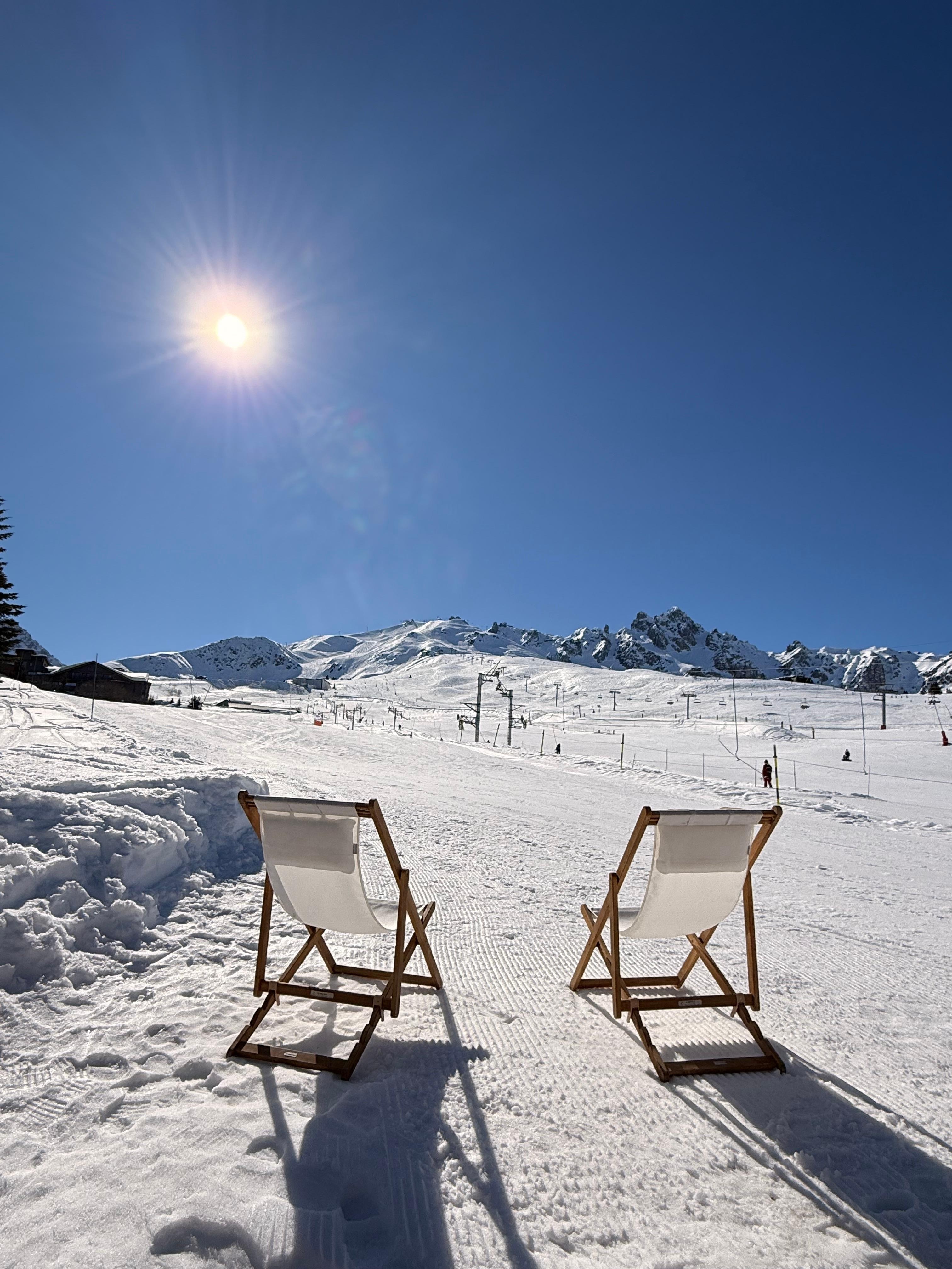 View of the mountains behind the hotel. Ski in and ski out. Drinks outside.
