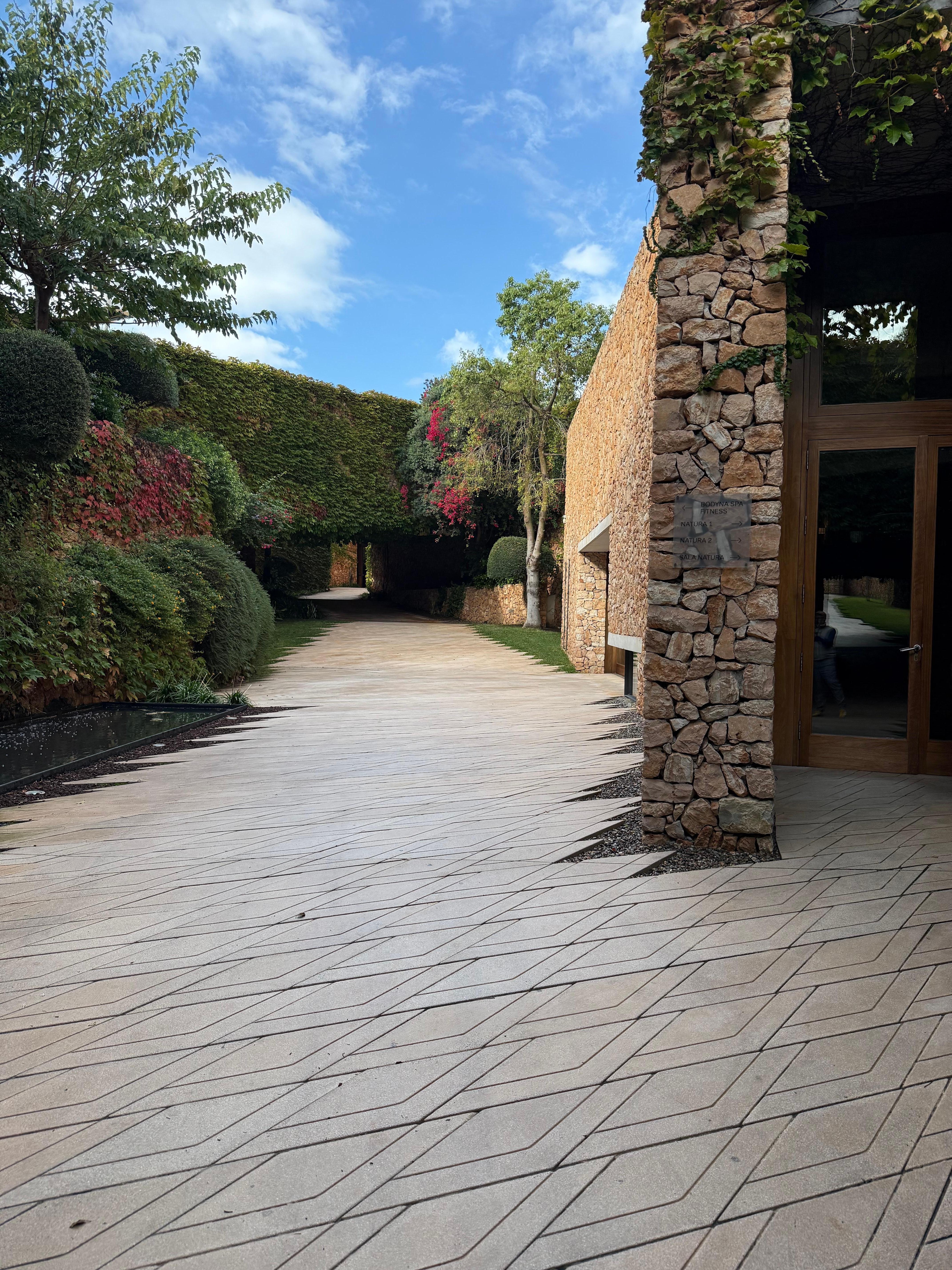 The gardens outside the modern buildings are beautiful 