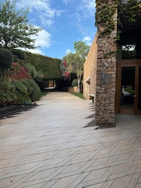 The gardens outside the modern buildings are beautiful