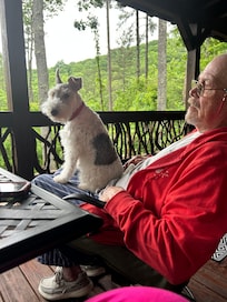 Enjoying morning coffee & the view from the porch.
