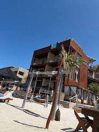 Beach view of one of the buildings.