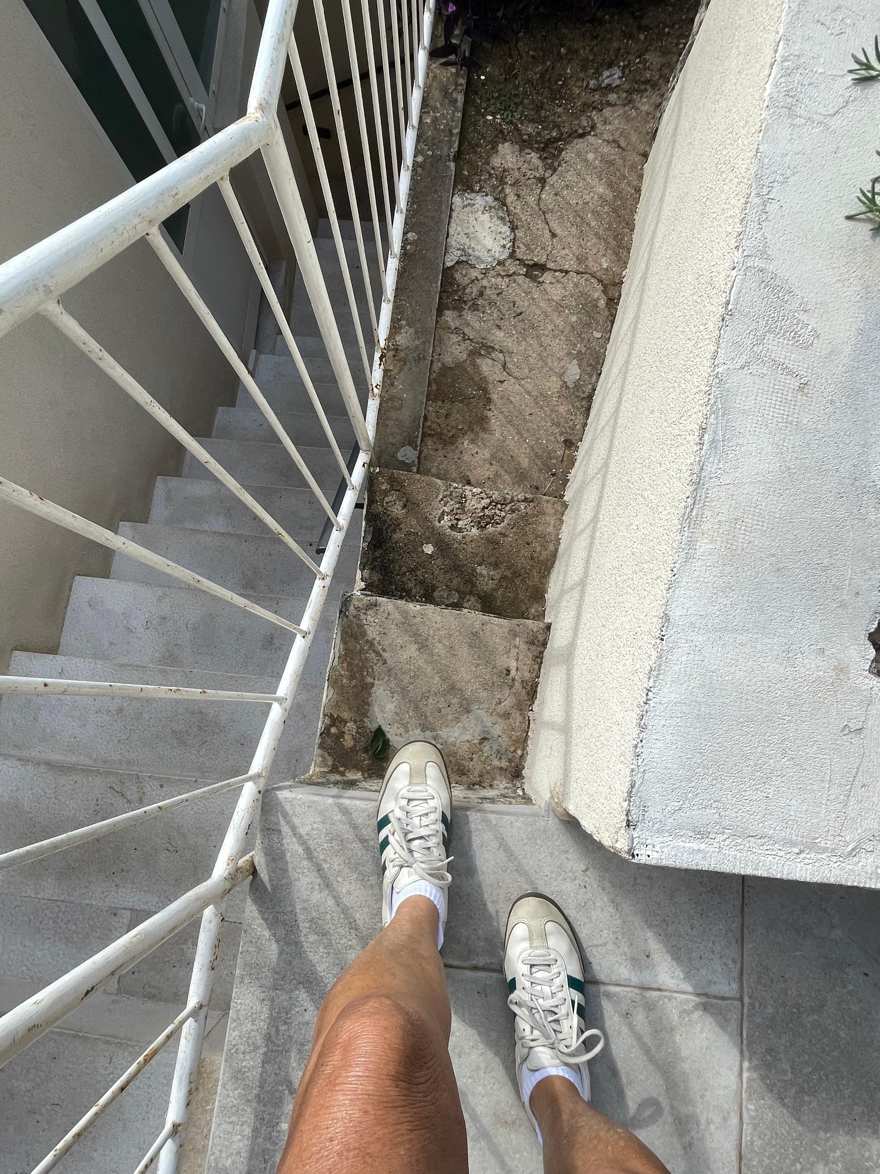 Stair to get to entrance to suite. 