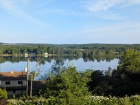 Great view out the front of the home, inside or off the small balcony for morning coffee. Watch the Ranger III on its travels to and from Isle Royale.