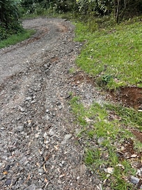 Last climb to house with steep drop off both sides , no lighting