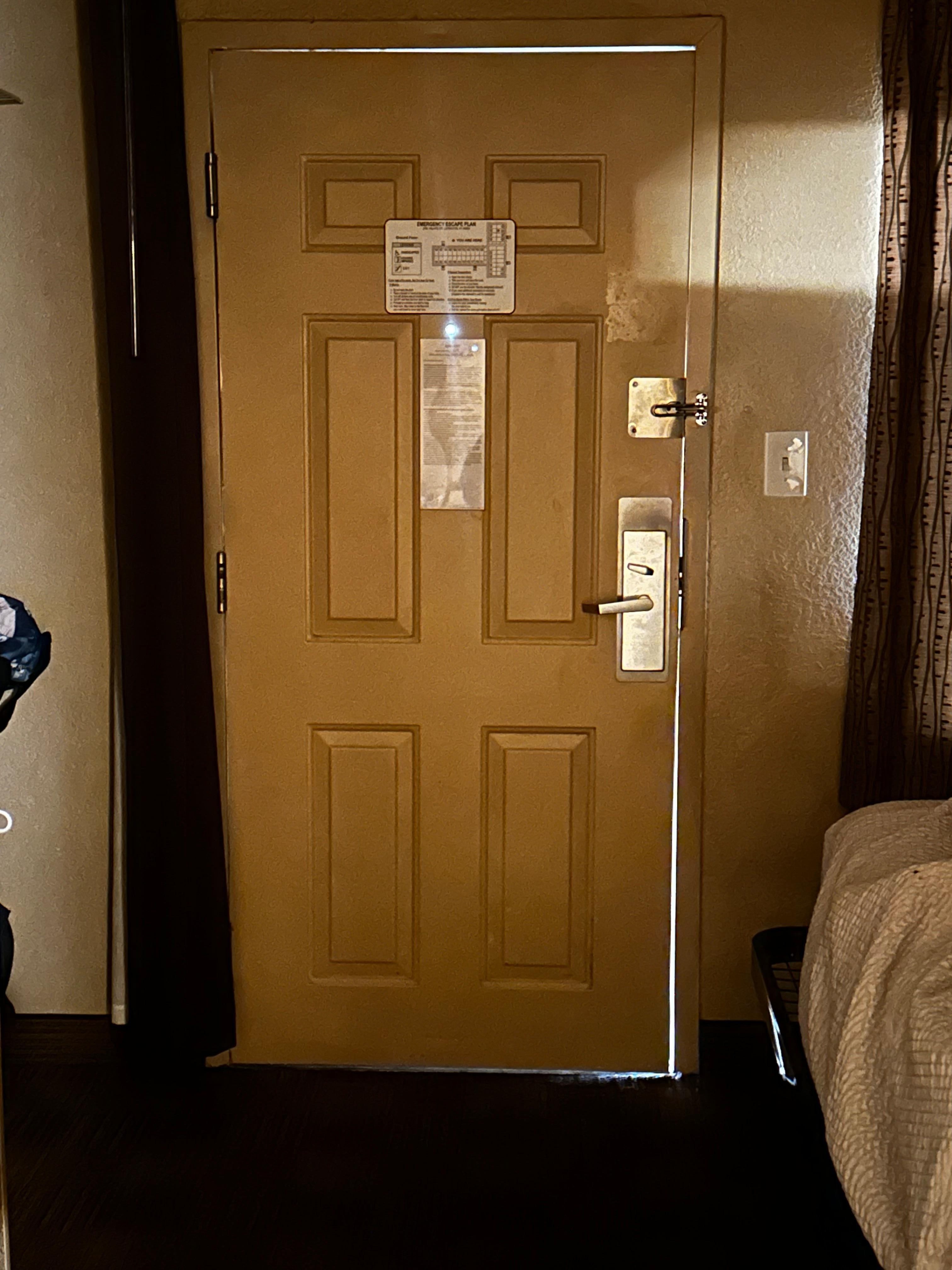 Sunlight coming through the door where it was not sealed properly. 