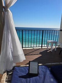 Rooftop cabana bed is perfect for enjoying a good book while enjoying the sun