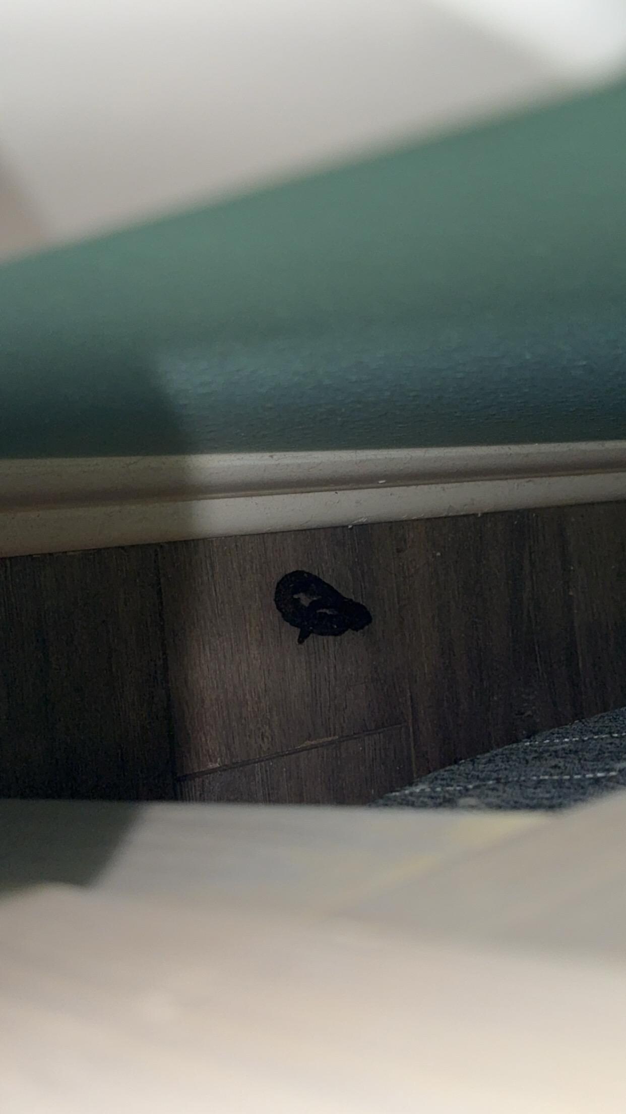 Behind the bed 