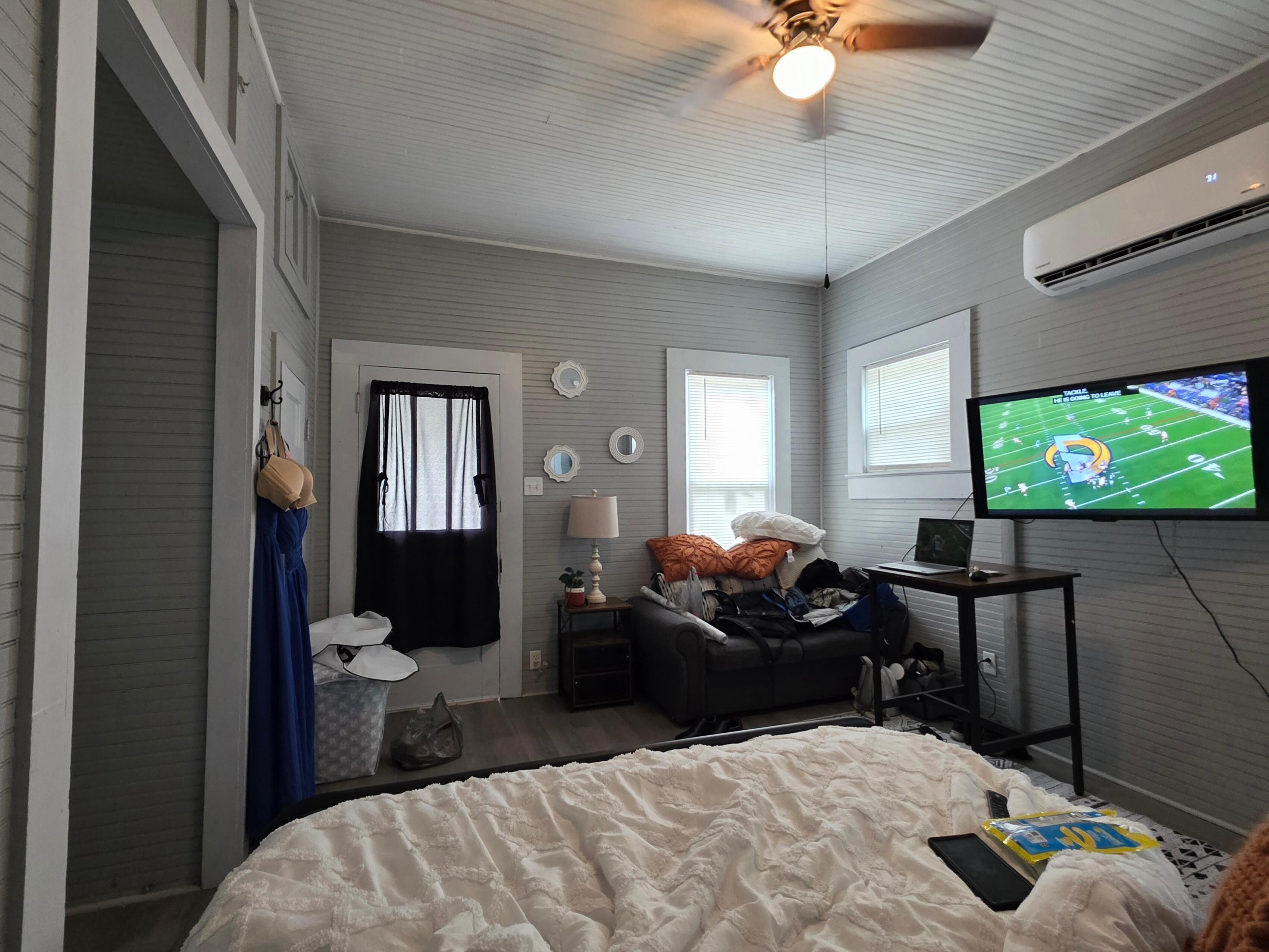 View from the bed to the front door