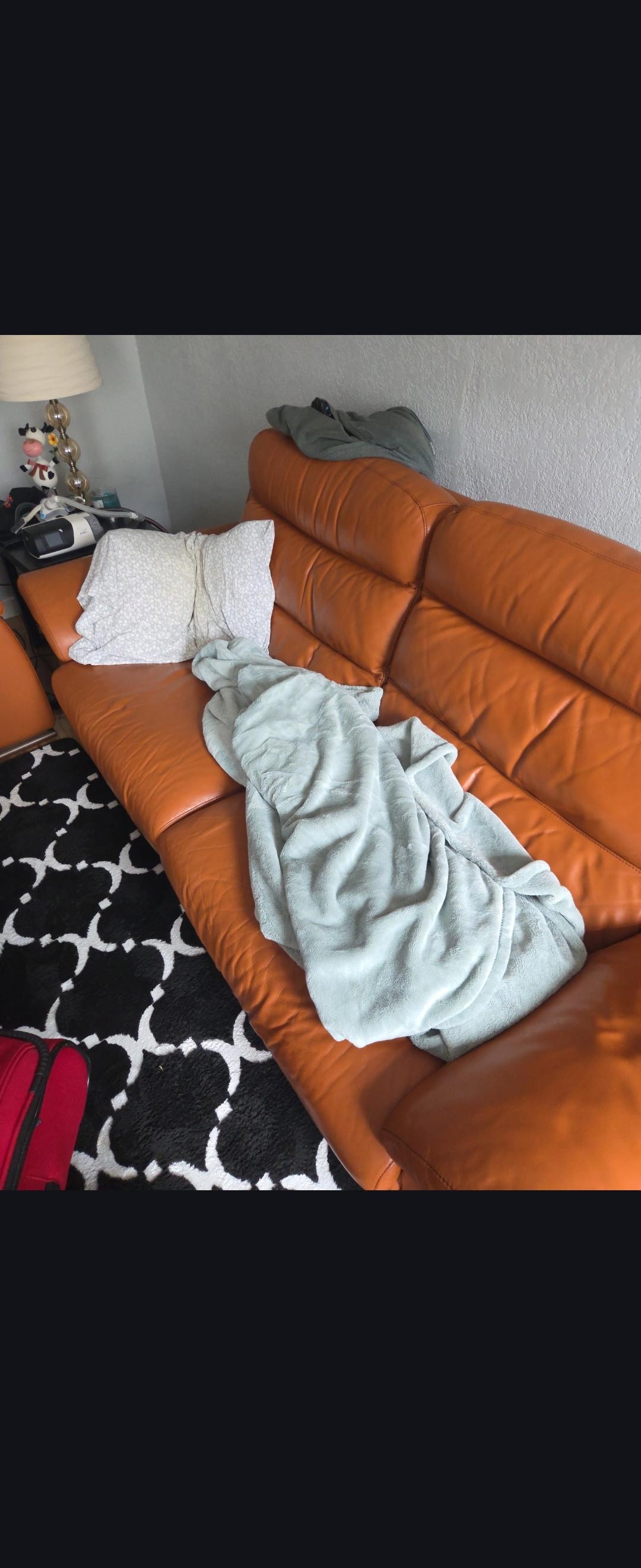 Proof of cpap next to couch.