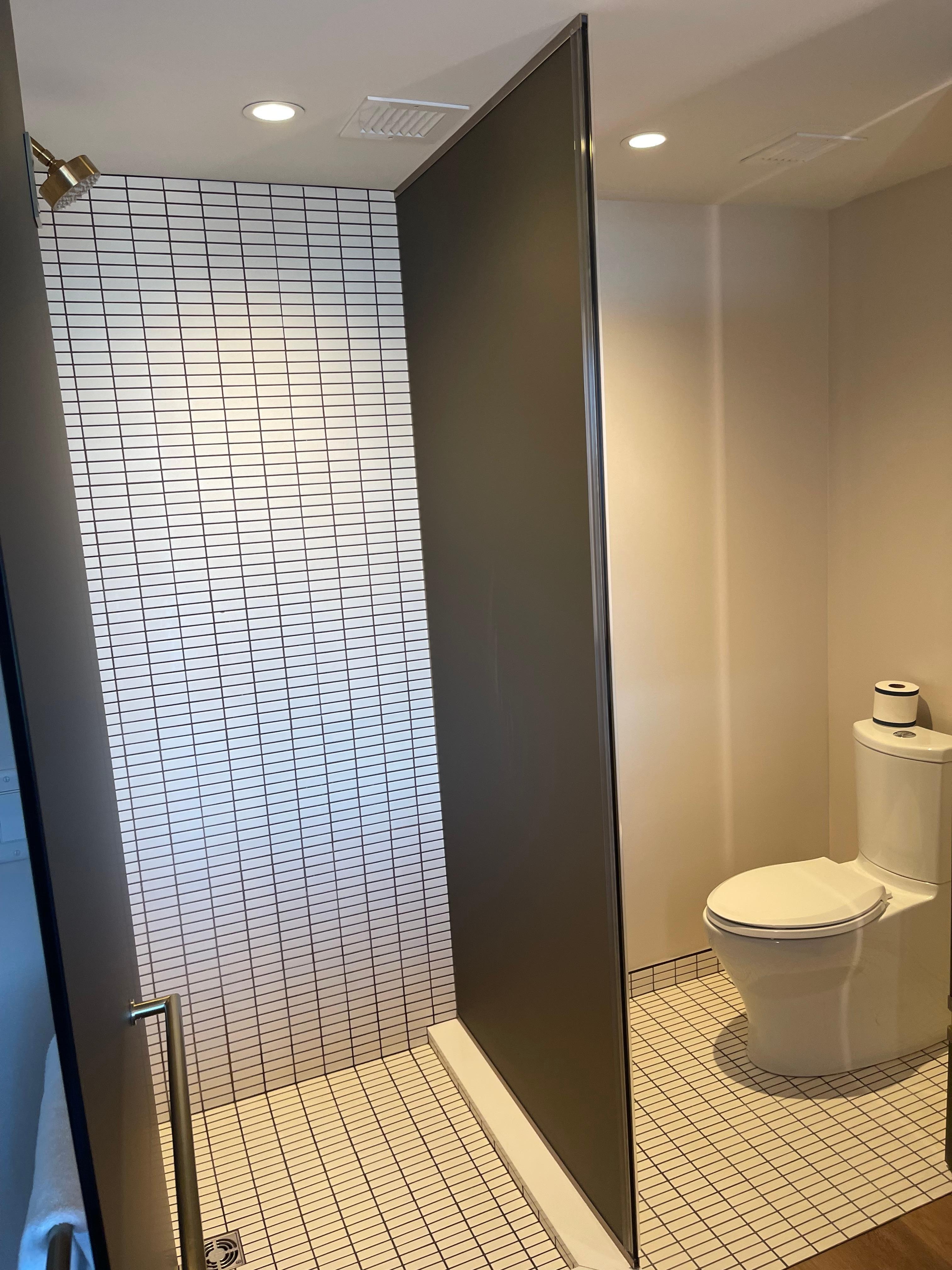 Toilet and Shower glass room. 