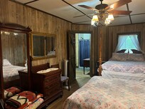View of 1 of 2 upstairs bedrooms looking into a Jack&Jill bathroom