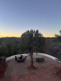 Lower patio and spa from house patio
